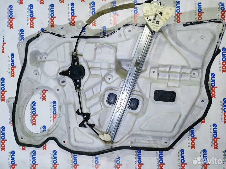 Стеклоподъемник электр. передний левый Mazda Mazd