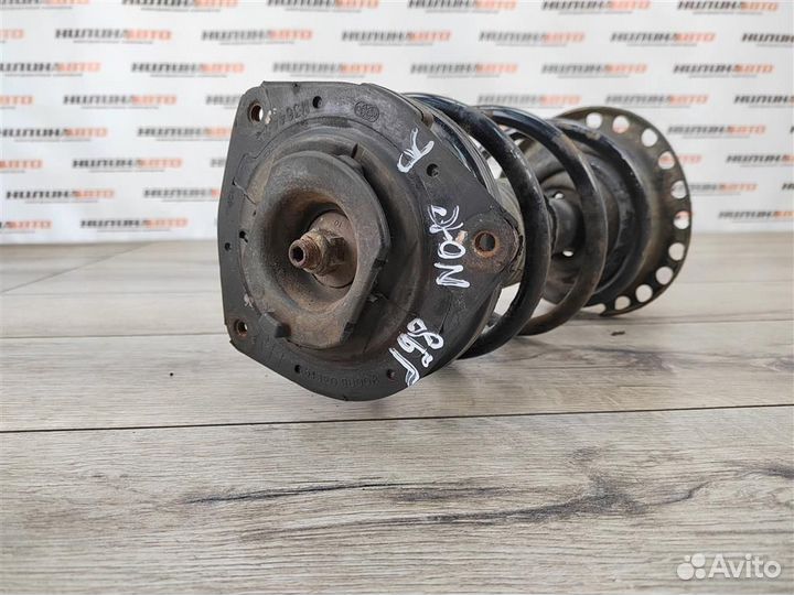 Амортизатор передний правый nissan Note 1 E11