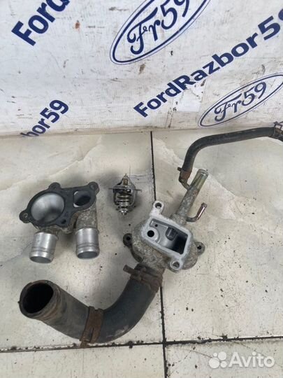 Корпус термостата Kia Rio 2 JB 1.4 (G4EE) 2009