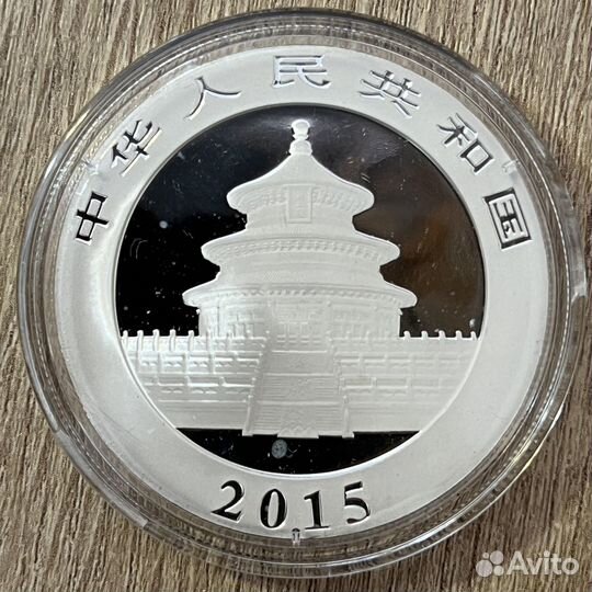 Серебряные монеты Панда Китай