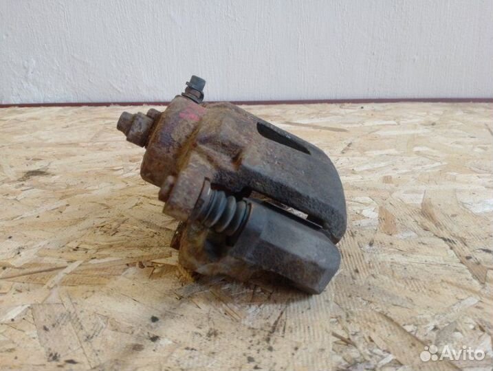 Суппорт тормозной передний левый Chevrolet Lanos