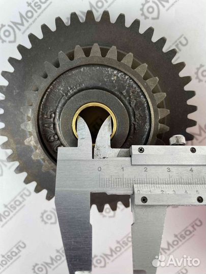 Блок шестерен Урал заднего хода и пускового механи
