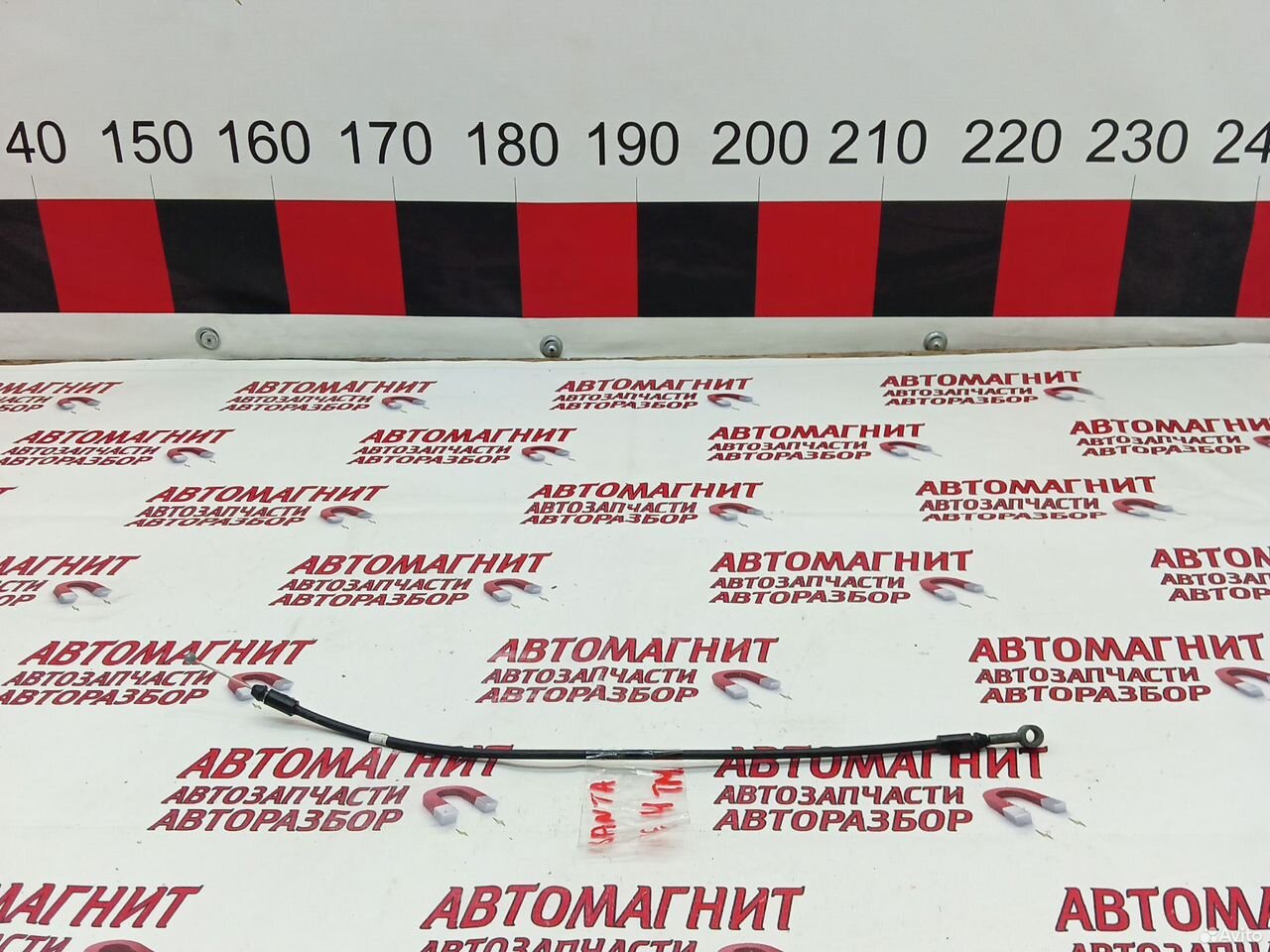 Трос замка капота Хендай Санта Фе 4 тм