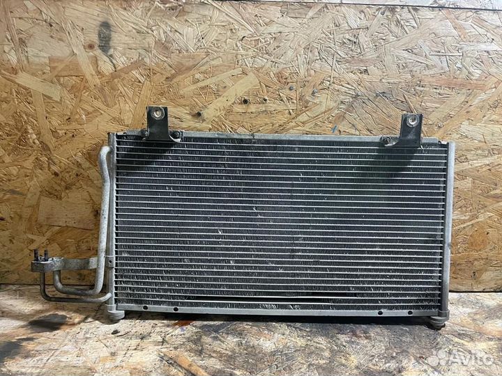 Радиатор кондиционера Киа Спектра