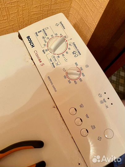 Стиральная машина с вертикальной загрузкой