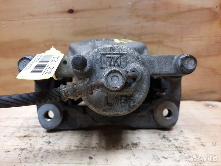 Суппорт передний левый Toyota Aqua NHP10 1nzfxe