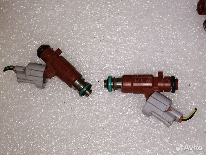 Топливная форсунка QG18DE