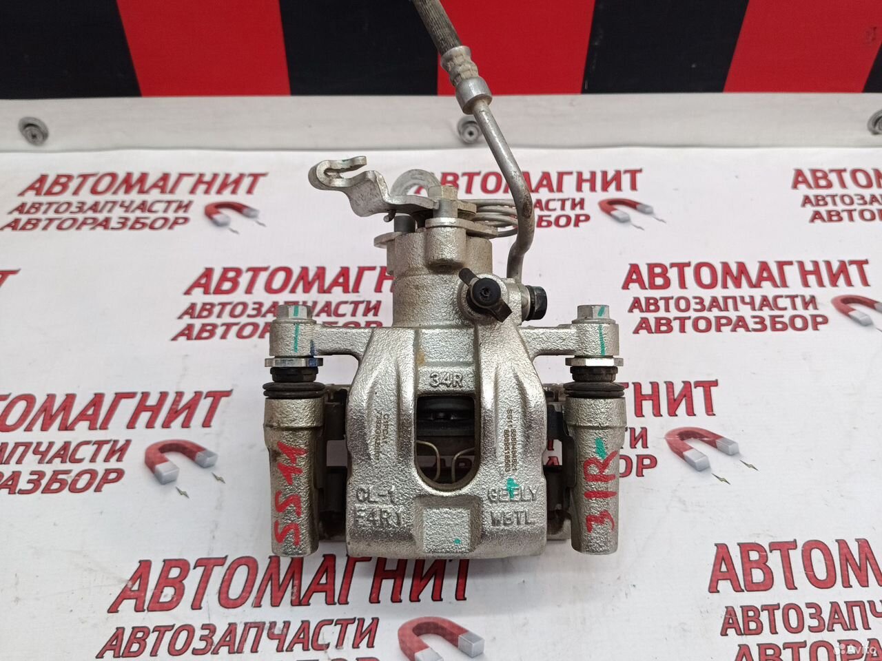 Супорт тормозной задний правый Geely Emgrand SS11