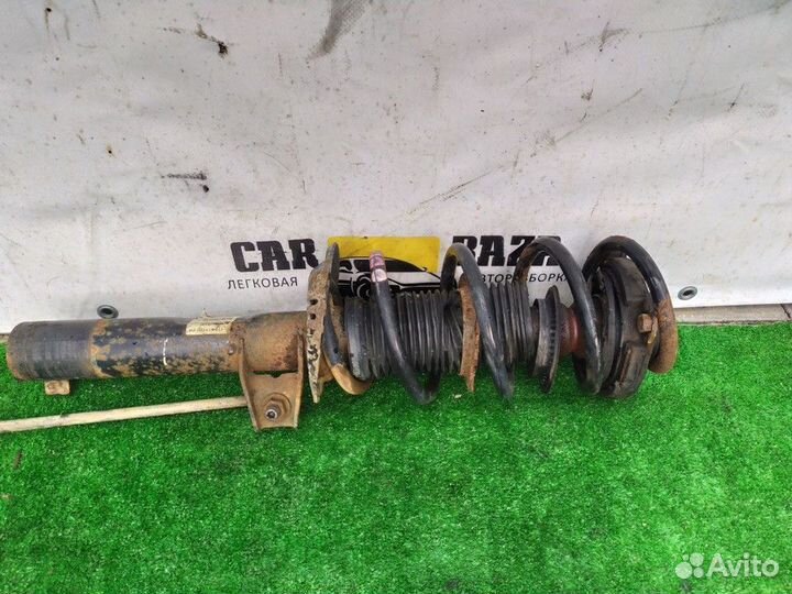 Амортизатор передний левый