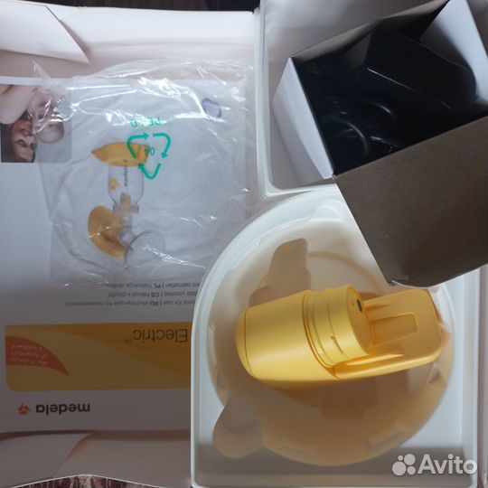 Молокоотсос Medela mini electric