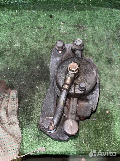 Суппорт тормозной передний правый Mazda Familia