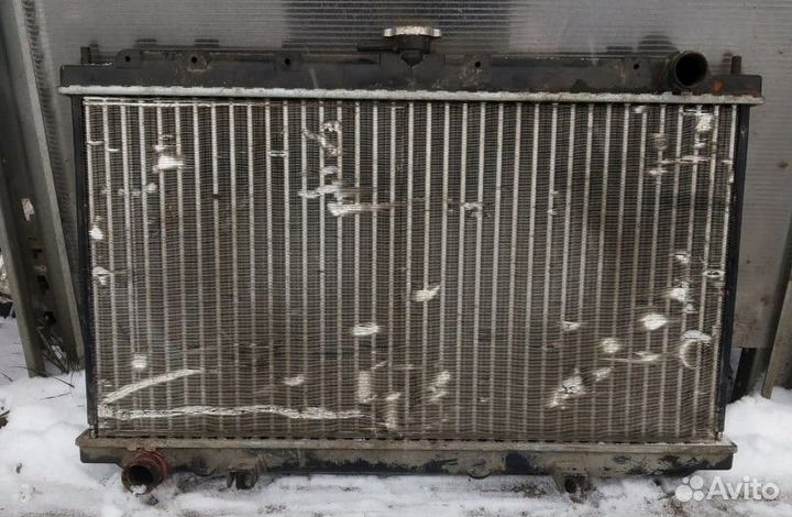 Радиатор охлаждения Nissan Primera p11