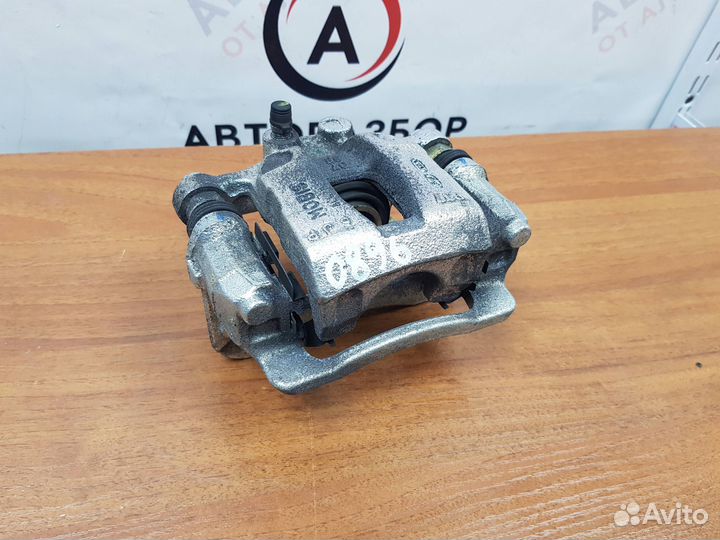 Суппорт задний левый Sportage (QL) 2016-2021