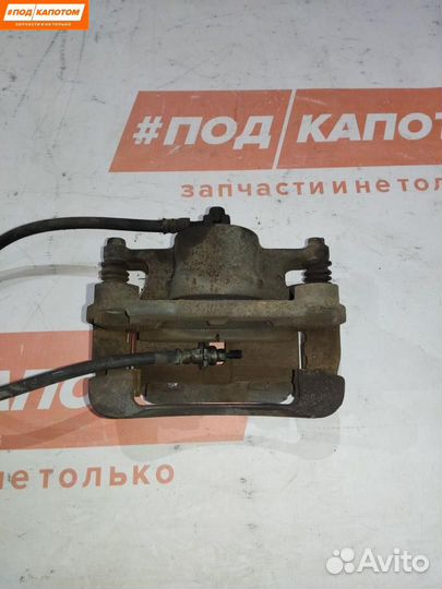 Суппорт тормозной передний левый Nissan X-Trail