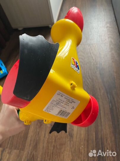 Игрушка каталка с ручкой