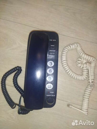 Телефон кнопочный