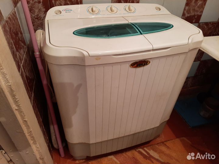 Стиральная машина с вертикальной загрузкой