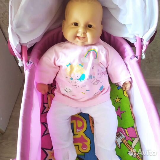 Игрушечная коляска с пупсиком