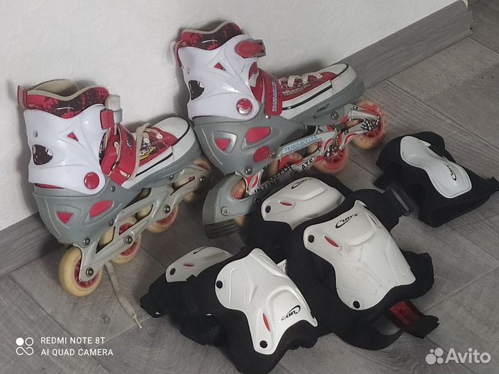 Роликовые коньки