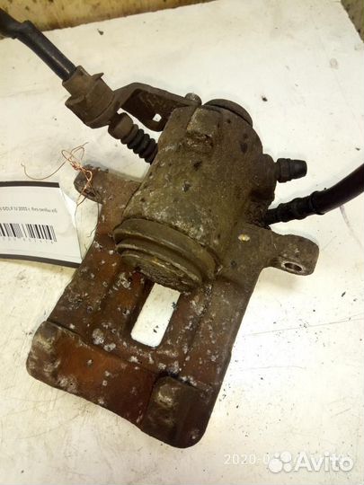 Суппорт задний левый Volkswagen Golf