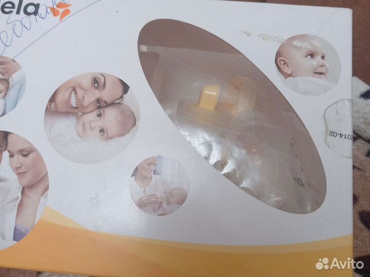 Молокоотсос medela ручной