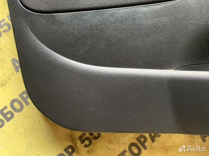 Обшивка двери передней левой Peugeot 207