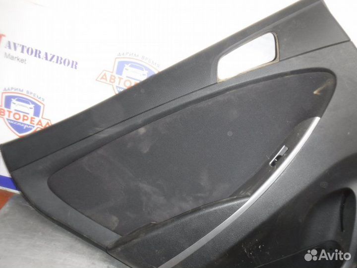 Обшивка двери задняя левая Hyundai Solaris G4FC