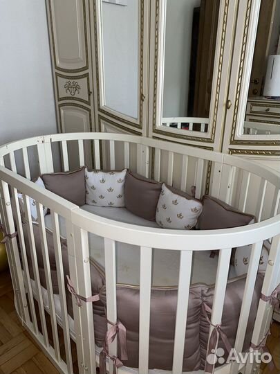 Детская кроватка трансформер с маятником