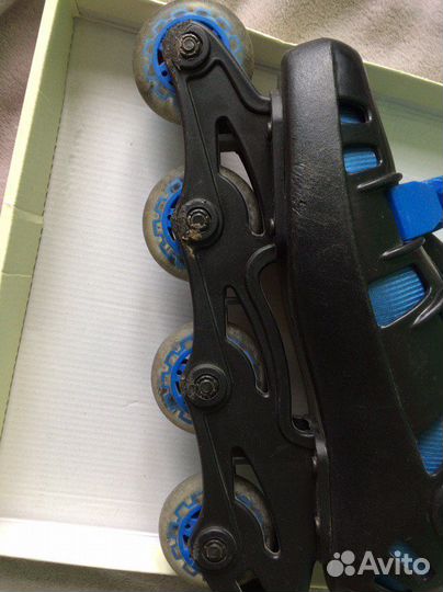 Роликовые коньки