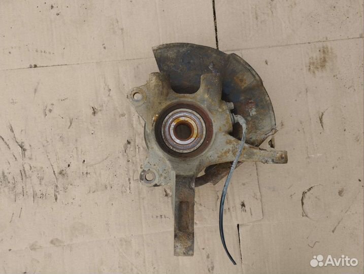 Передний левый поворотный кулак Hyundai Tucson