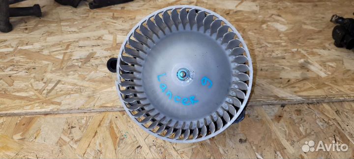 Моторчик отопителя Mitsubishi Lancer 9