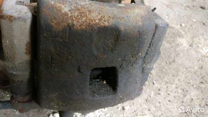 Суппорт Mazda 323 BJ Familia левый правый