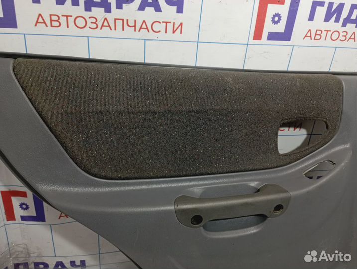 Обшивка двери задней левой Hyundai Accent (LC) 833