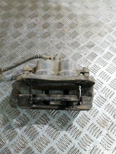 Суппорт тормозной передний левый Ssangyong Actyon