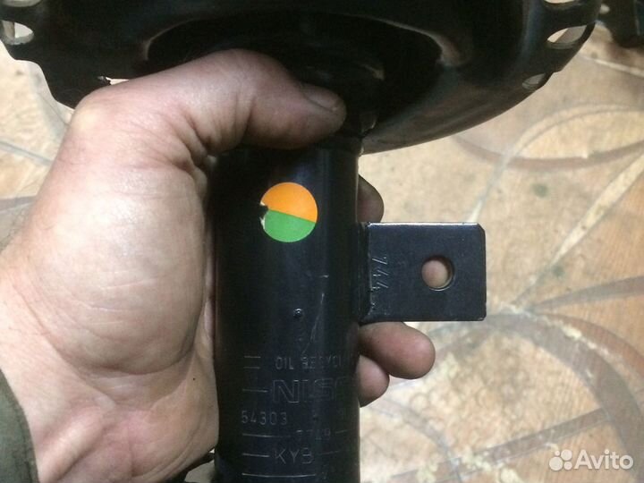 Стойка передняя Ниссан ноут