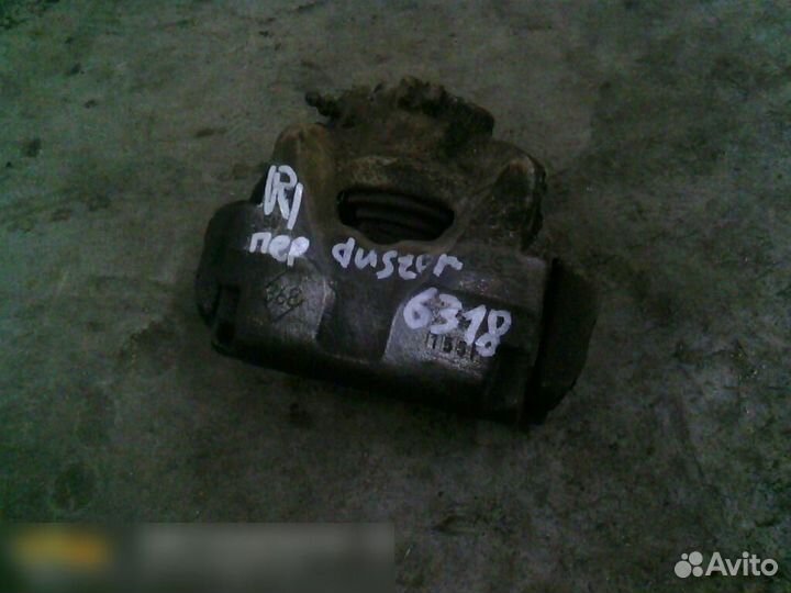 Суппорт передний правый Renault Duster 2012