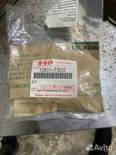 Натяжитель цепи Suzuki 12831-77E02