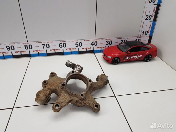 Кулак задний правый