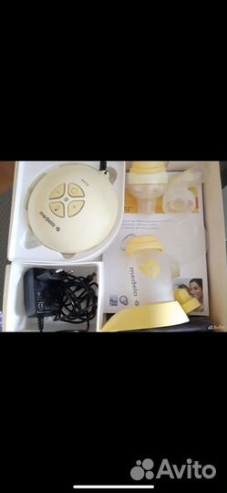 Молокоотсос medela электрический
