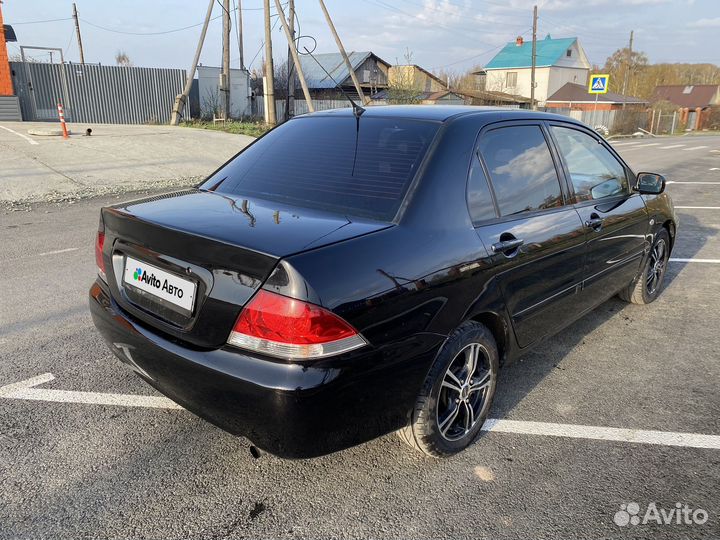 Mitsubishi Lancer 1.6 МТ, 2005, 305 000 км