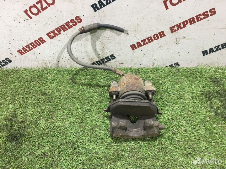 Суппорт тормозной передний левый Skoda Yeti