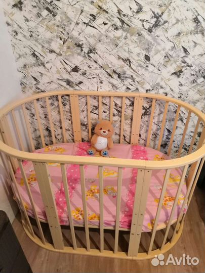 Детская кроватка с маятником круглая