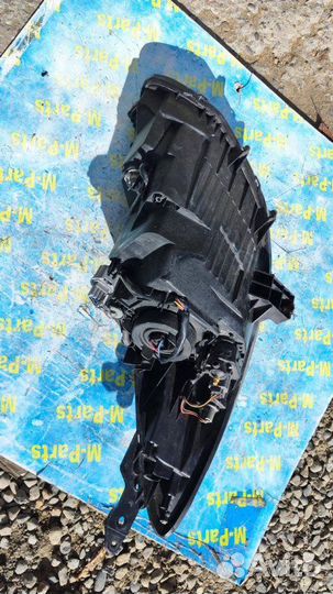 Фара левая Mazda Demio DE3FS