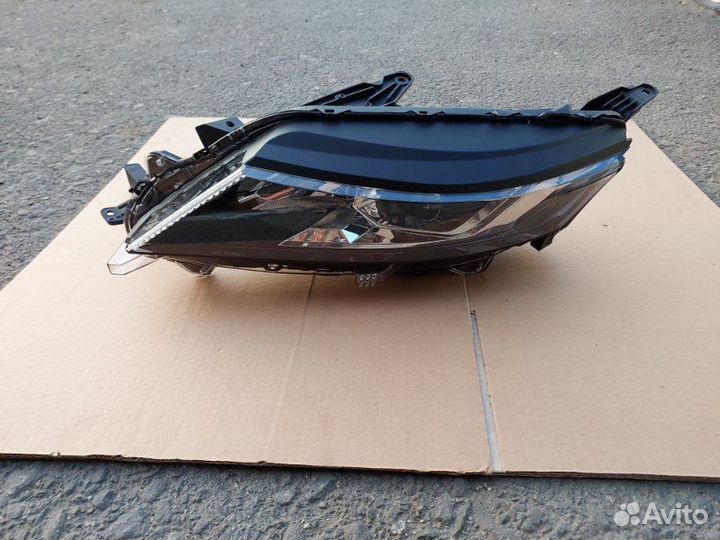 Фара левая передняя левая Mitsubishi L200