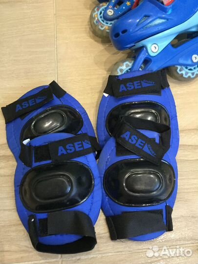 Роликовые коньки