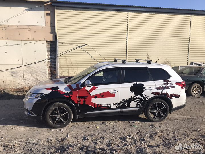 Изготовление наклеек и брендирование авто