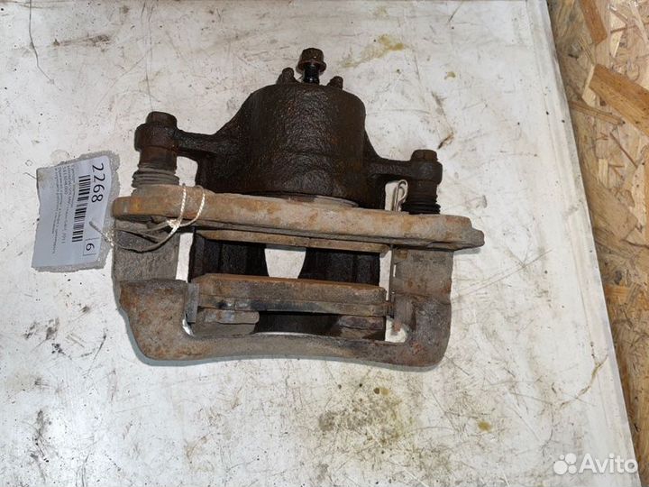 Суппорт тормозной передний левый Hyundai Solaris 1