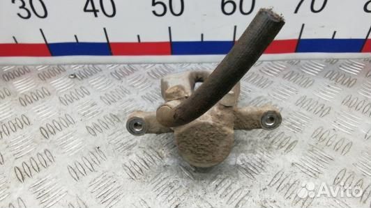 Суппорт тормозной задний правый toyota avensis T25