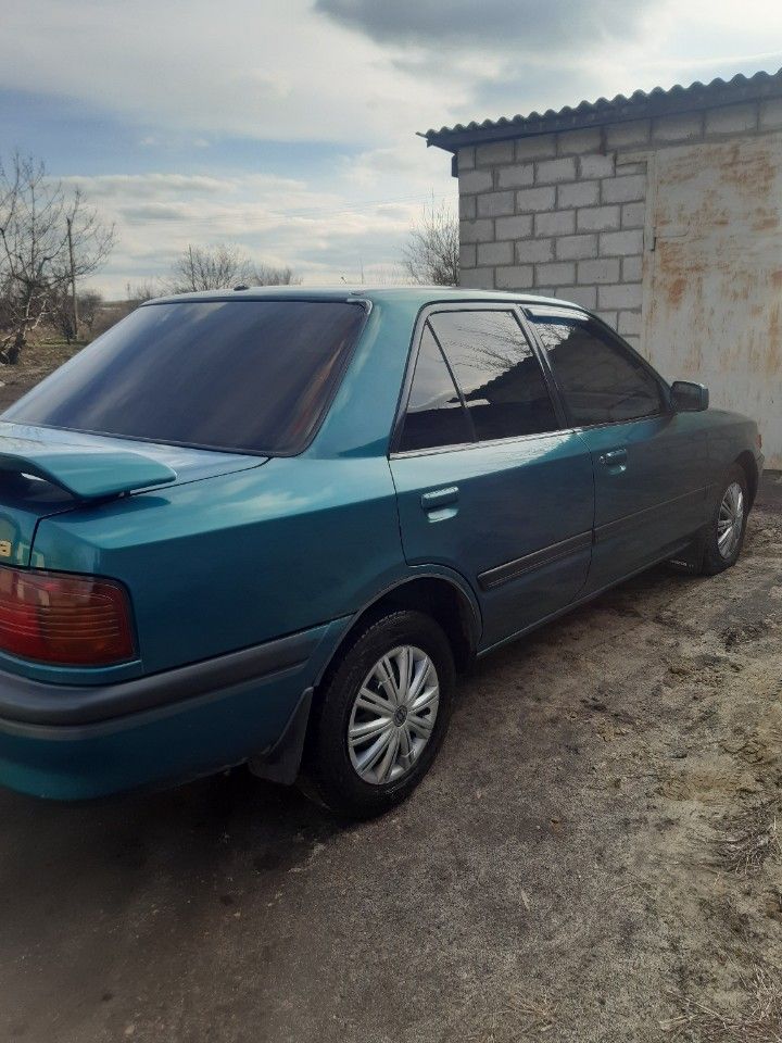 Mazda 323: фото владельца