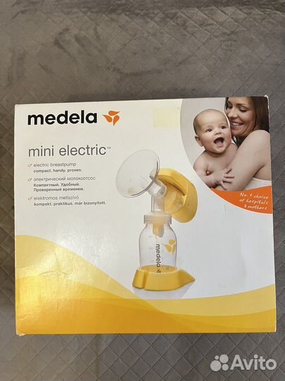 Молокоотсос medela электрический